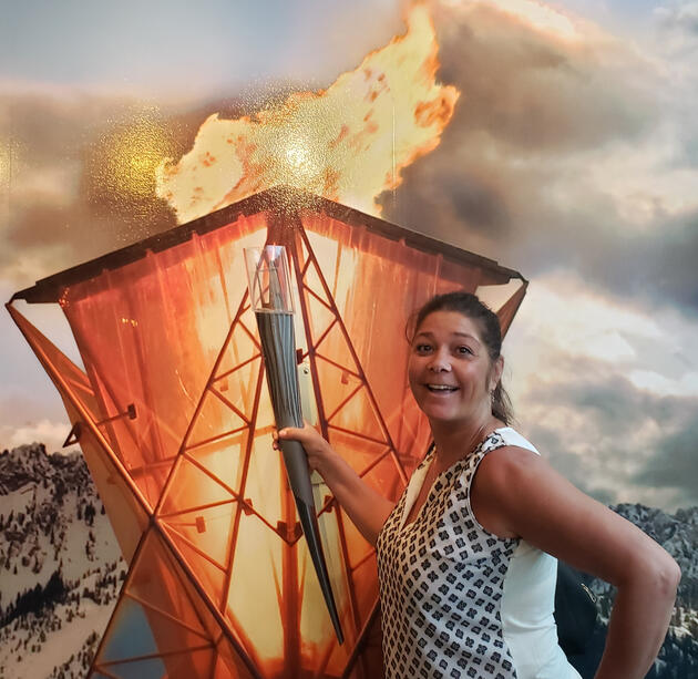 Gigi wields the Olympic Torch